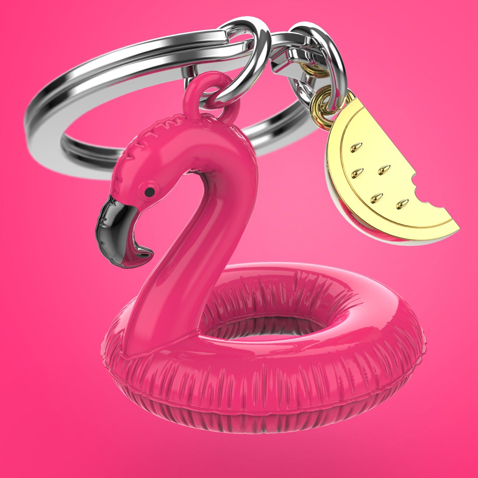 Keychain with pink flamingo pool float and gold charm on a pink background