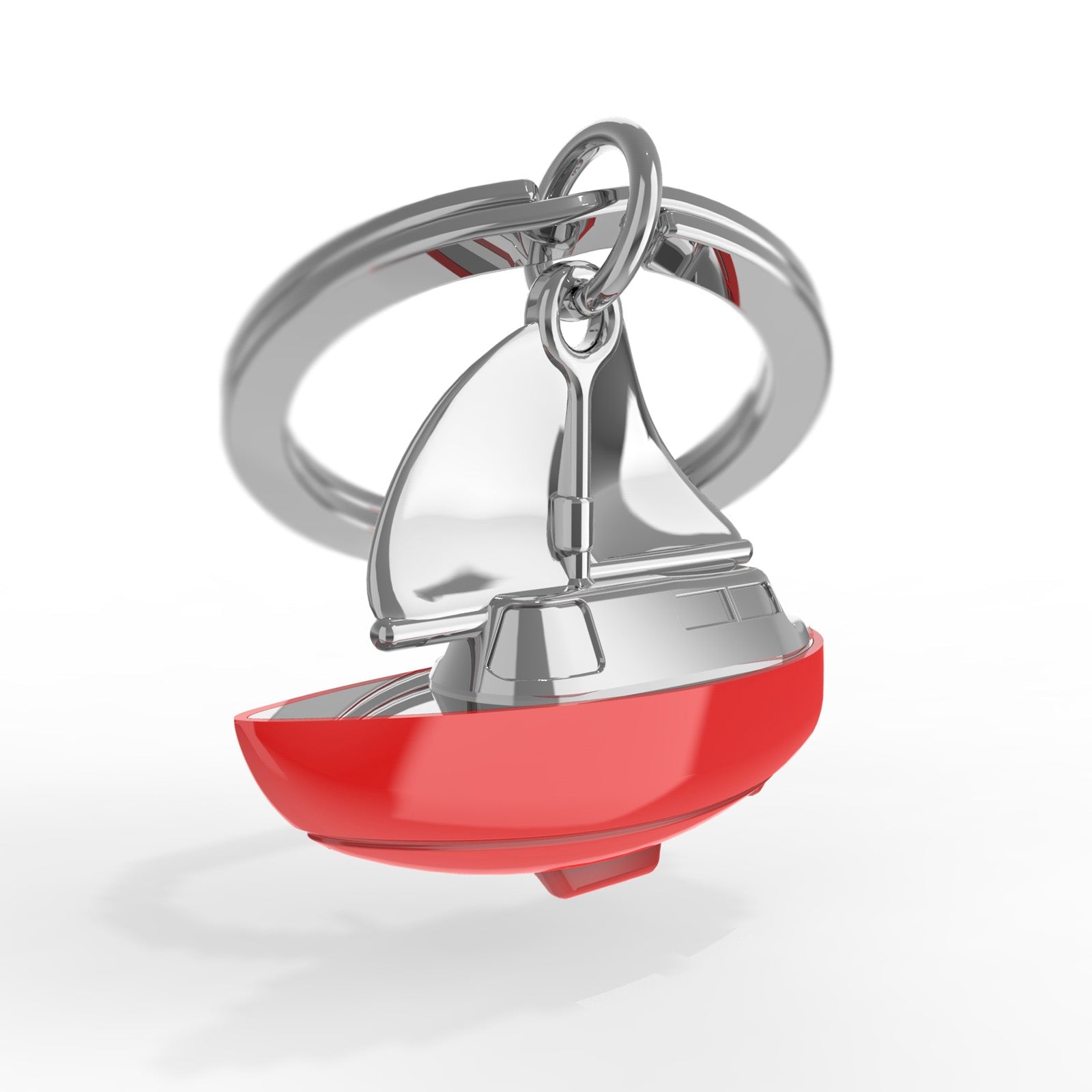 Red and silver sailboat keychain on a white background